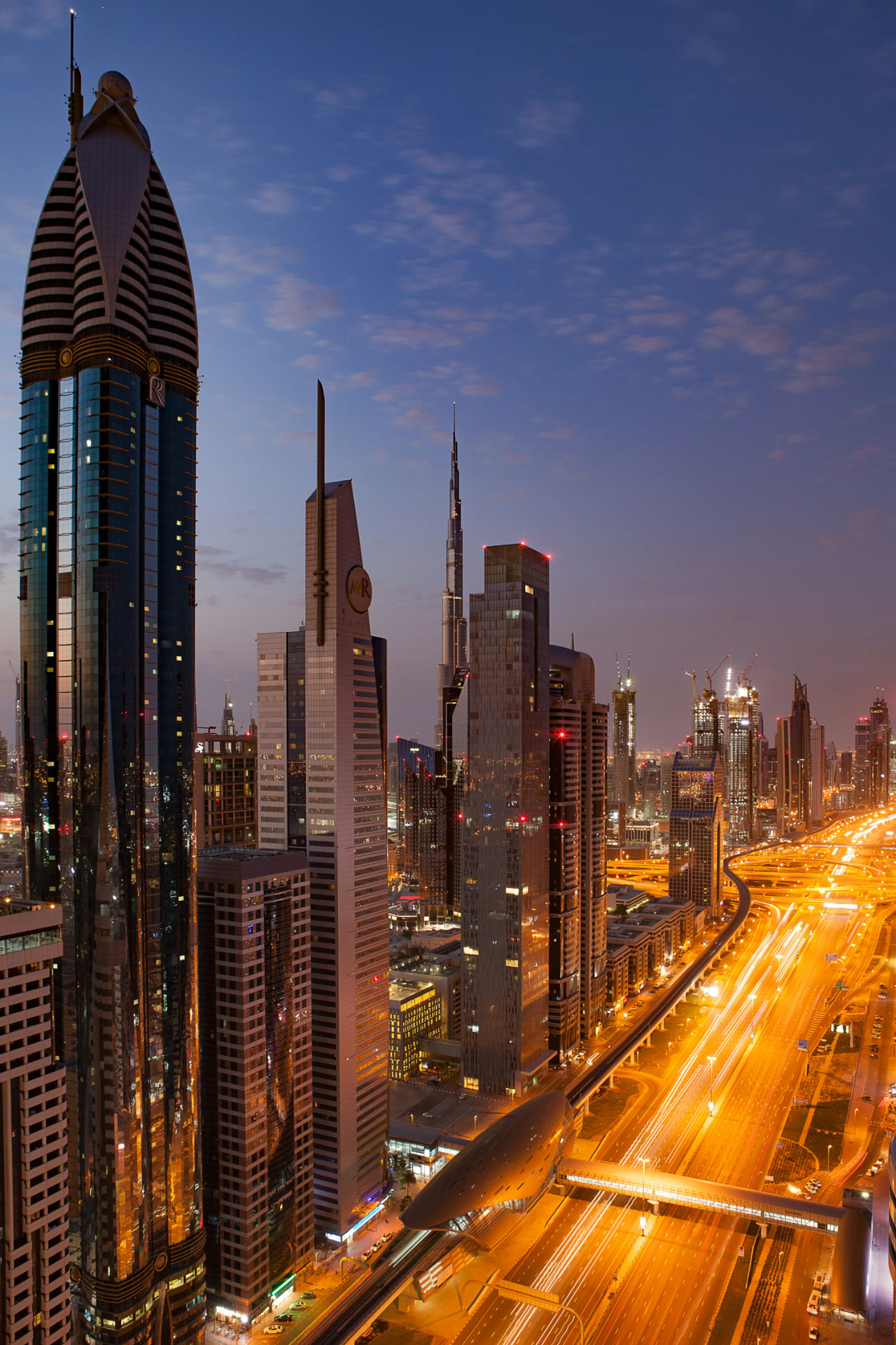 Sheikh Zayed Road skyline at night with light trails